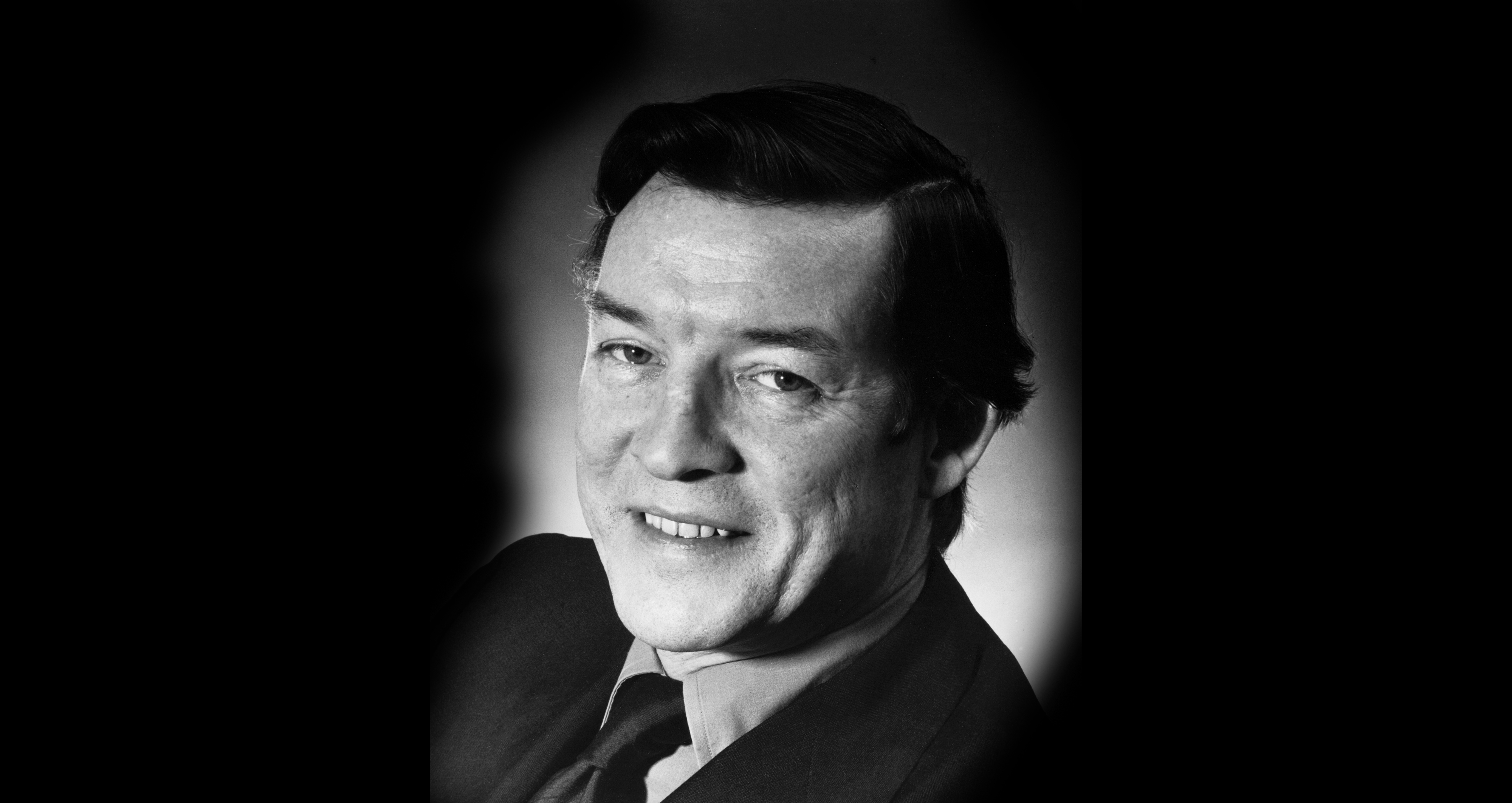 Black and white portrait of Alexander Gibson, founder of Scottish Opera