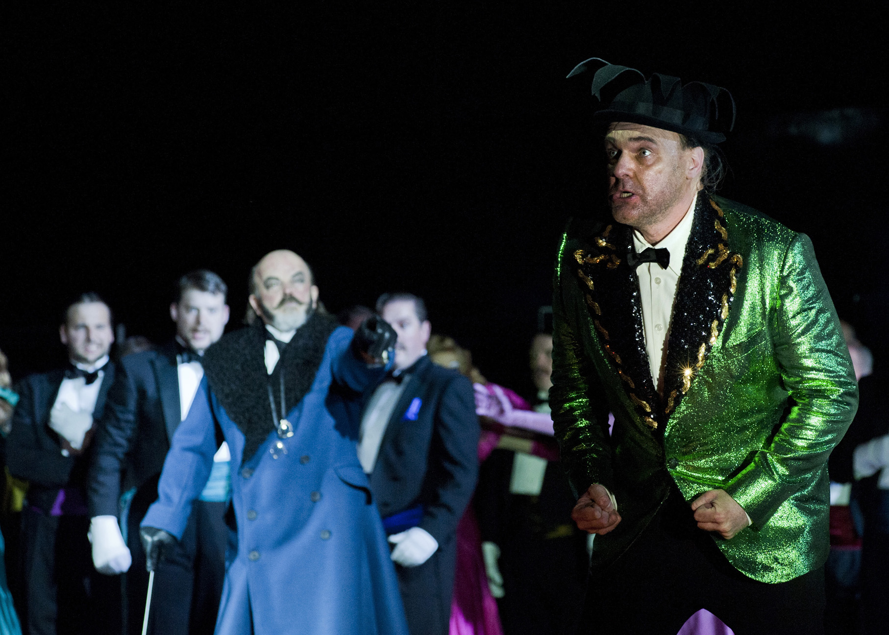 Scottish Opera's Rigoletto - Alan Fairs (Monterone), Eddie Wade (Rigoletto) and chorus Credit Richard Campbell.jpg