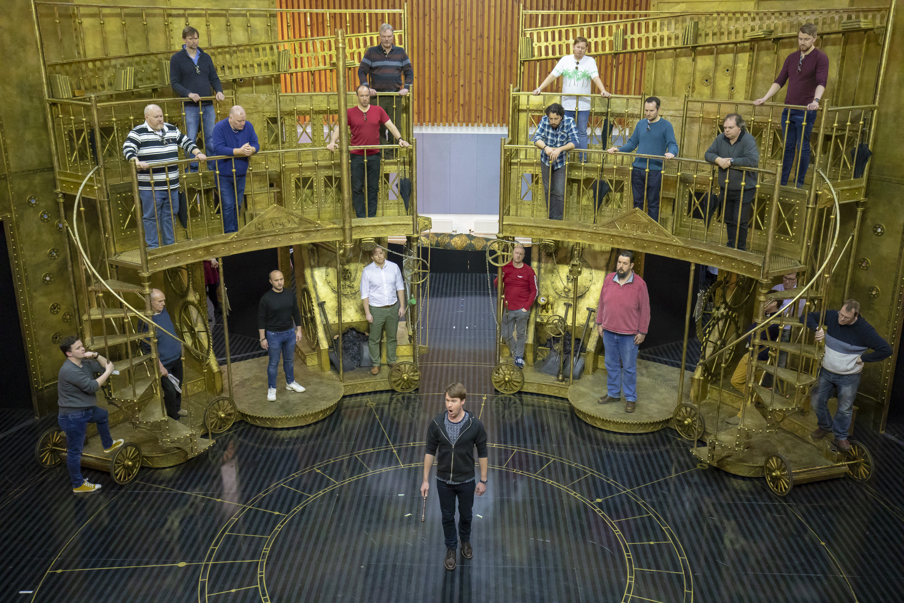 Peter Gijsbertsen (Tamino) and the Chorus of The Magic Flute in rehearsals. Scottish Opera 2019. Credit James Glossop.JPG