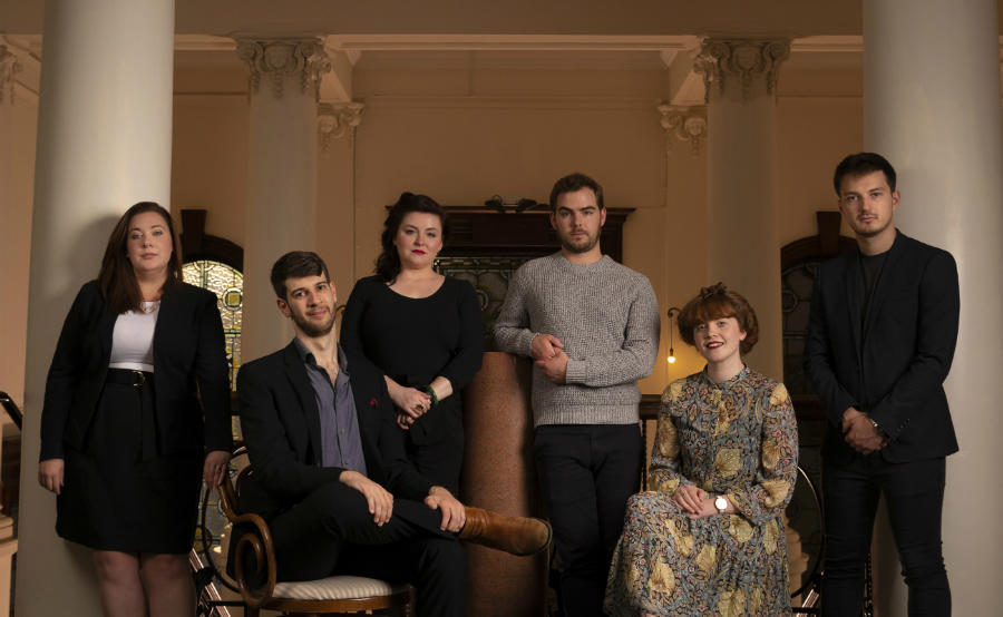 The six Scottish Opera Emerging Artists 2019/20 in front of white columns