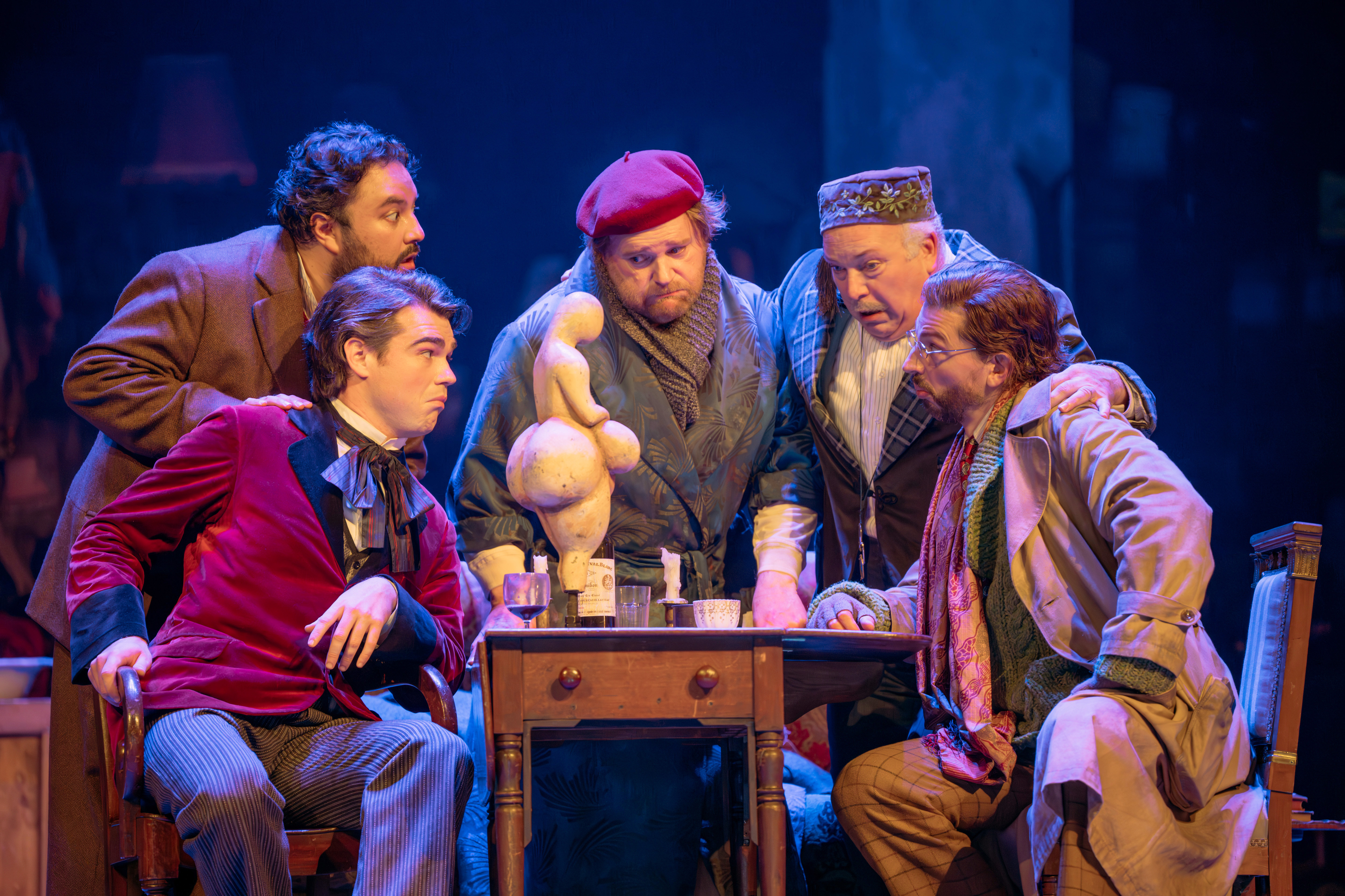Edward Jowle (Schaunard), Mario Chang (Rodolfo), Roland Wood (Marcello), Jamie Macdougall (Benoit), And Callum Thorpe (Colline) In La Boheme 2025. Credit Mihaela Bodlovic..