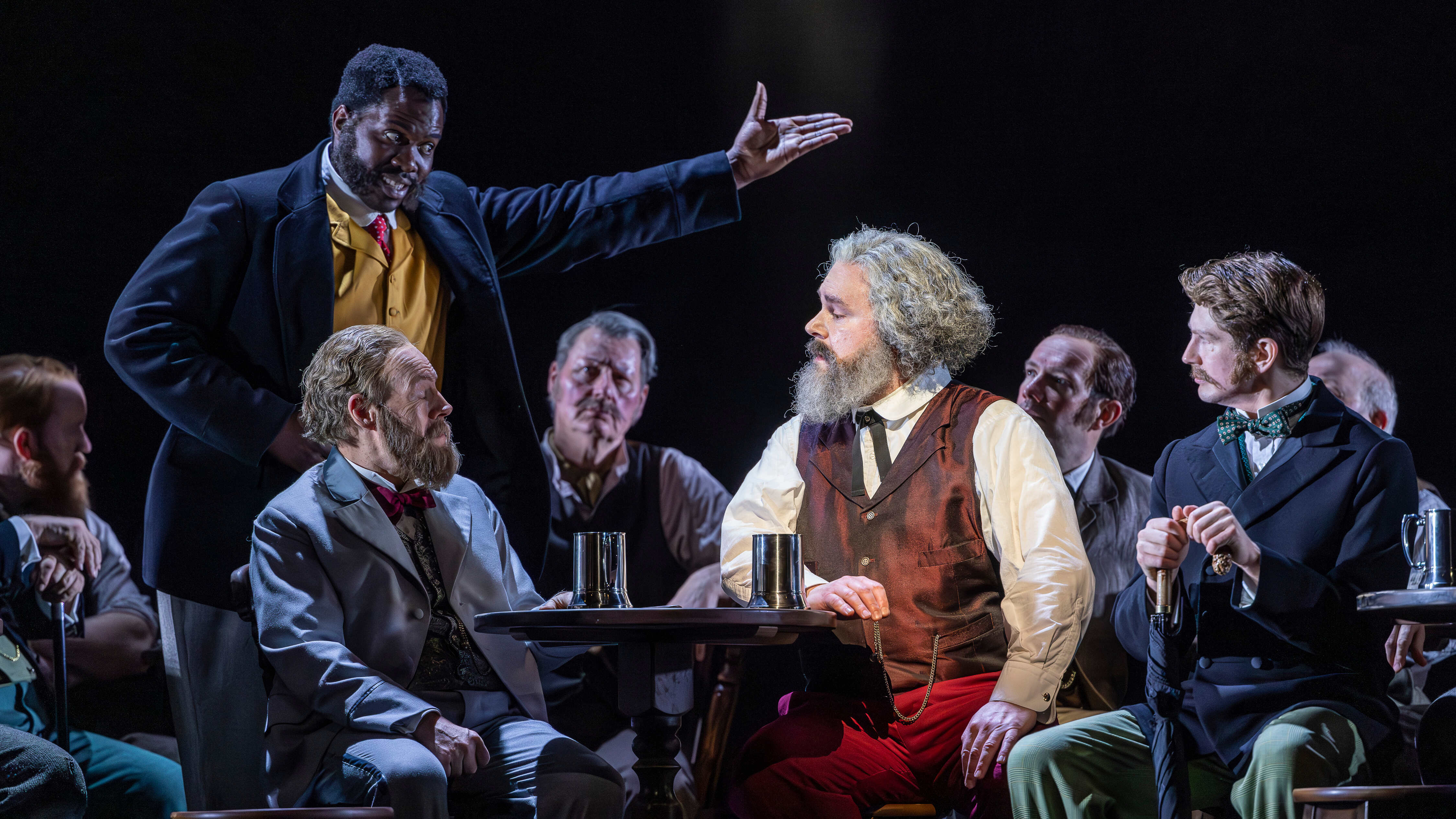 Chuma Sijeqa as Franz, Alasdair Elliott as Friedrich Engels and Roland Wood as Karl Marx in Scottish Opera's Production of Marx in London!. Credit James Glossop..